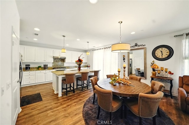 5073 S Mccleve Way W, Ontario, CA 91762 - dining area with healthy amount of natural light, light wood-type flooring, and recessed lighting