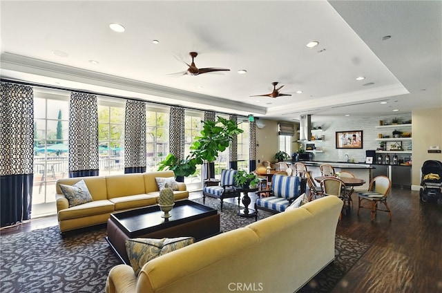 5073 S Mccleve Way W, Ontario, CA 91762 - living area with a raised ceiling, ornamental molding, ceiling fan, wood finished floors, and plenty of natural light