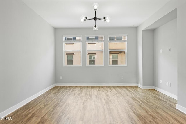 623 W Foothill Blvd Unit 43, Glendora, CA 91741 - unfurnished room with a chandelier and wood finished floors