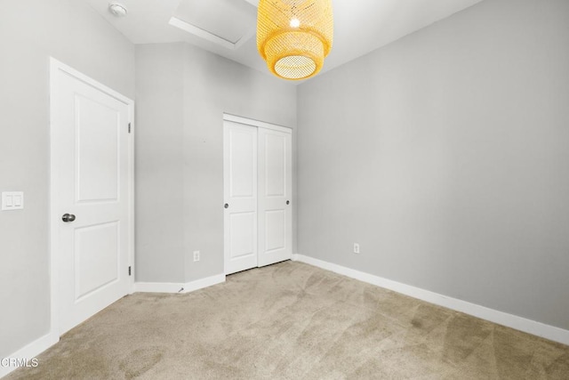 623 W Foothill Blvd Unit 43, Glendora, CA 91741 - unfurnished bedroom featuring carpet flooring, attic access, and a closet