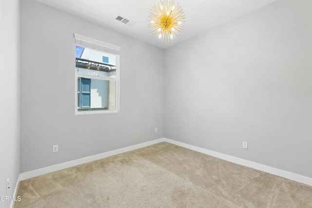 623 W Foothill Blvd Unit 43, Glendora, CA 91741 - empty room with a chandelier and carpet flooring