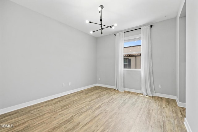 623 W Foothill Blvd Unit 43, Glendora, CA 91741 - empty room featuring a chandelier and light wood-style floors