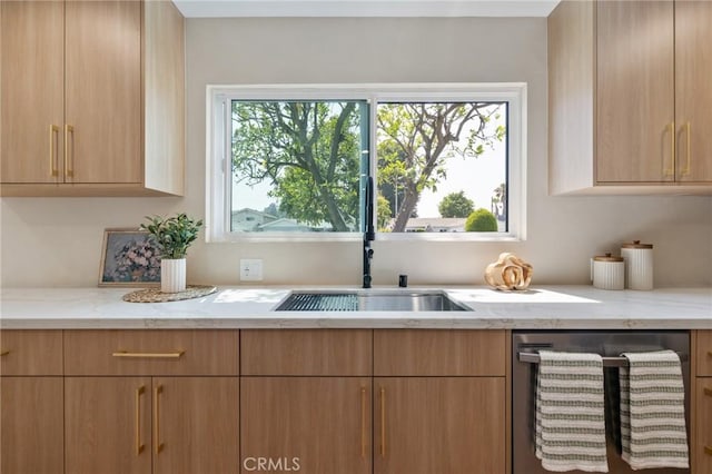 8840 Valjean Ave, North Hills, CA 91343 - kitchen featuring stainless steel dishwasher, healthy amount of natural light, and light stone countertops