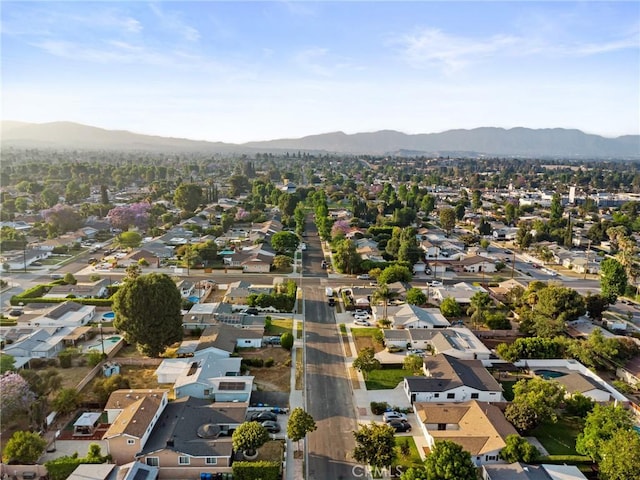 8840 Valjean Ave, North Hills, CA 91343 - aerial view of property's location featuring nearby suburban area and a mountain backdrop