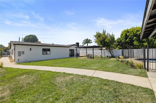 8840 Valjean Ave, North Hills, CA 91343 - fenced backyard featuring a patio area