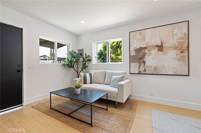8840 Valjean Ave, North Hills, CA 91343 - living area with wood finished floors and recessed lighting