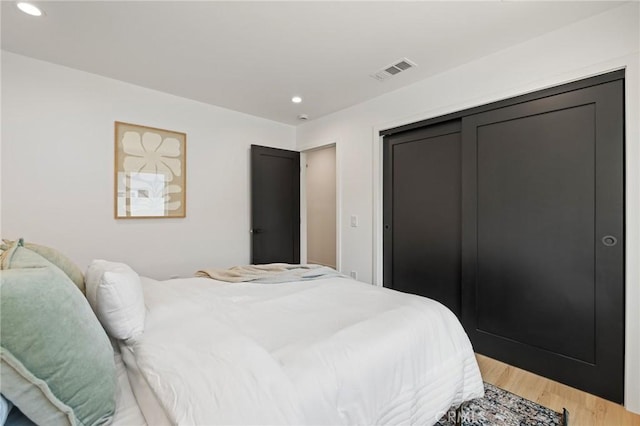 8840 Valjean Ave, North Hills, CA 91343 - bedroom featuring recessed lighting, light wood-type flooring, and a closet
