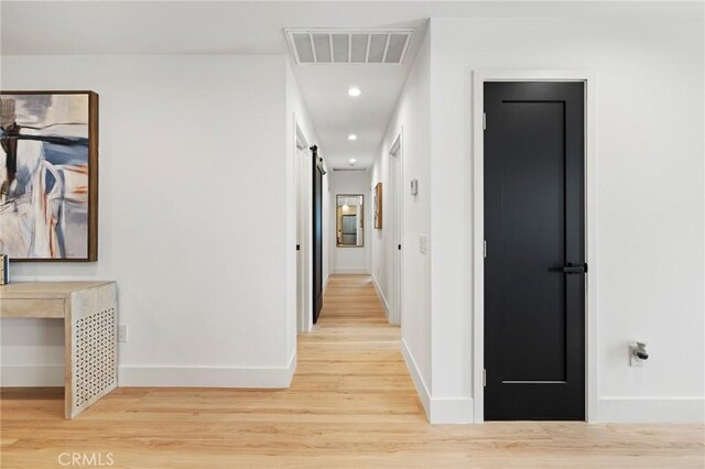 8840 Valjean Ave, North Hills, CA 91343 - hallway with light wood-style flooring and recessed lighting