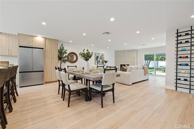 8840 Valjean Ave, North Hills, CA 91343 - dining room featuring light wood-type flooring and recessed lighting