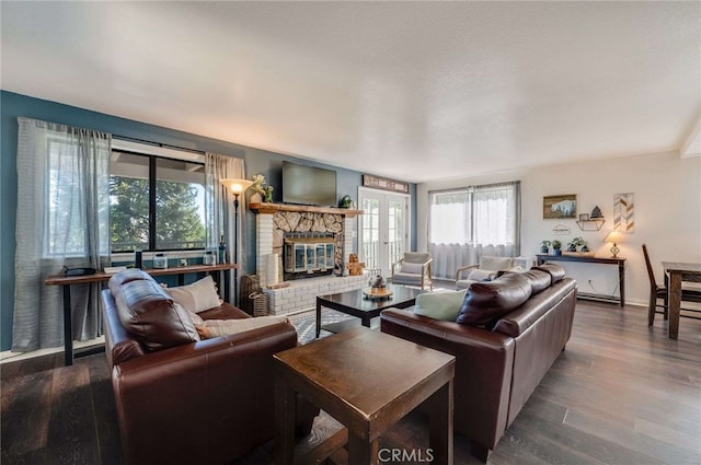 25389 Oak Glen Rd, Twin Peaks, CA 92391 - living area with wood finished floors and a glass covered fireplace