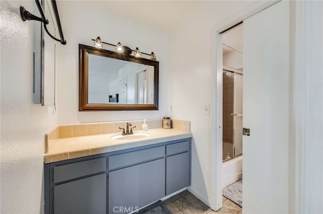 25389 Oak Glen Rd, Twin Peaks, CA 92391 - full bathroom featuring vanity, enclosed tub / shower combo, and tile patterned flooring