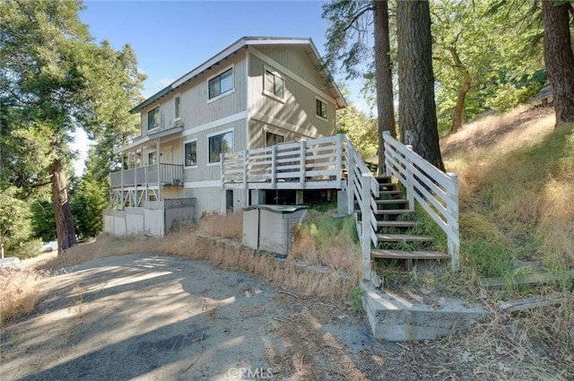 25389 Oak Glen Rd, Twin Peaks, CA 92391 - back of house with a deck and stairway
