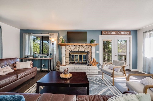 25389 Oak Glen Rd, Twin Peaks, CA 92391 - living area featuring wood finished floors, a fireplace, and french doors