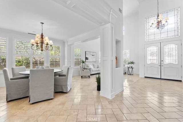 20342 Via Cellini, Porter Ranch, CA 91326 - foyer featuring a chandelier, healthy amount of natural light, crown molding, and french doors