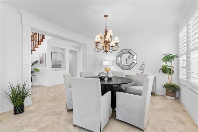 20342 Via Cellini, Porter Ranch, CA 91326 - dining area featuring a chandelier, light stone finish flooring, ornamental molding, and stairway