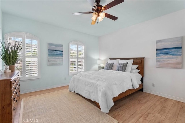 20342 Via Cellini, Porter Ranch, CA 91326 - bedroom with light wood finished floors and a ceiling fan