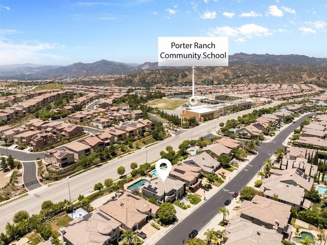 20342 Via Cellini, Porter Ranch, CA 91326 - aerial view of residential area with a mountainous background