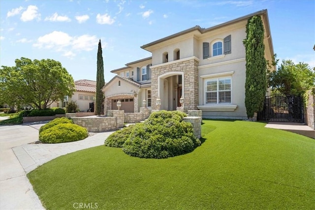 20342 Via Cellini, Porter Ranch, CA 91326 - view of front of house with stucco siding, stone siding, and a front lawn