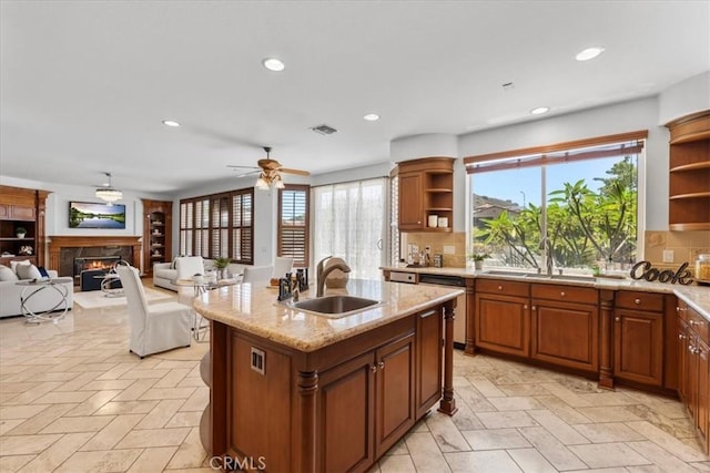 20342 Via Cellini, Porter Ranch, CA 91326 - kitchen featuring open shelves, stainless steel dishwasher, a lit fireplace, a ceiling fan, and recessed lighting