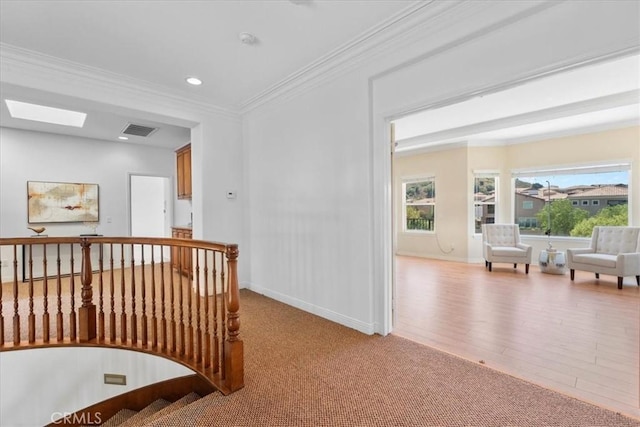 20342 Via Cellini, Porter Ranch, CA 91326 - hall featuring crown molding, an upstairs landing, recessed lighting, a skylight, and carpet