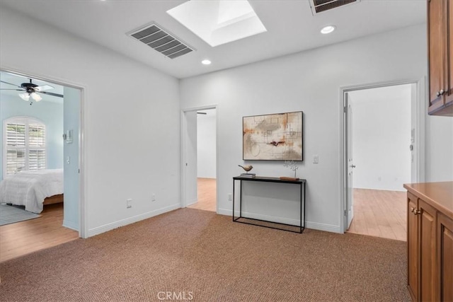 20342 Via Cellini, Porter Ranch, CA 91326 - unfurnished bedroom with light colored carpet, a skylight, and recessed lighting