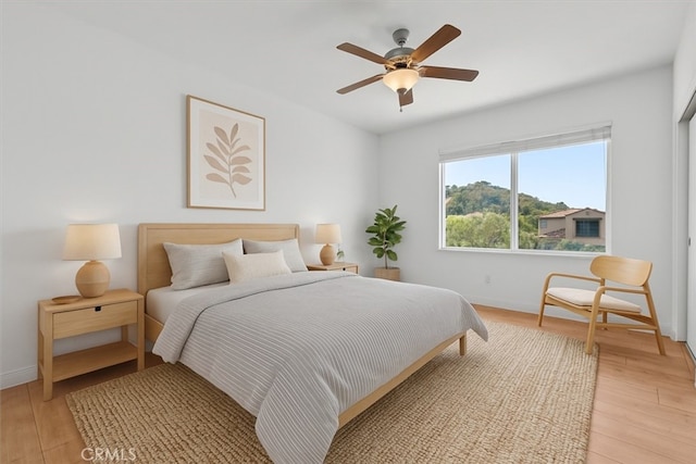 20342 Via Cellini, Porter Ranch, CA 91326 - bedroom featuring light wood-type flooring and ceiling fan