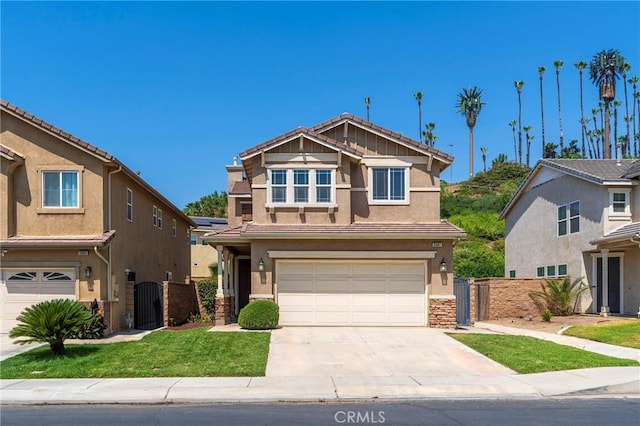 5681 Mapleview Dr, Jurupa Valley, CA 92509 - view of front of home featuring a gate, an attached garage, stucco siding, and concrete driveway