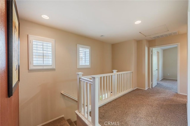 5681 Mapleview Dr, Jurupa Valley, CA 92509 - hall with an upstairs landing, plenty of natural light, carpet floors, attic access, and recessed lighting