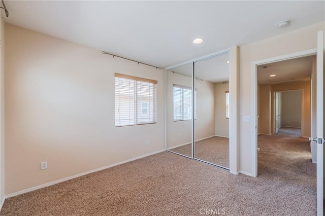 5681 Mapleview Dr, Jurupa Valley, CA 92509 - unfurnished bedroom featuring carpet flooring, recessed lighting, and a closet