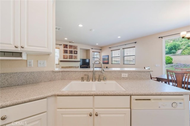 5681 Mapleview Dr, Jurupa Valley, CA 92509 - kitchen featuring dishwasher, white cabinets, recessed lighting, a peninsula, and open floor plan