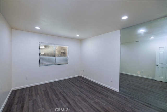1806 N Fairview St Unit J, Santa Ana, CA 92706 - spare room featuring dark wood-type flooring and recessed lighting