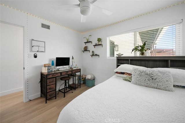450 Pecan St, Arroyo Grande, CA 93420 - bedroom featuring wood finished floors, a ceiling fan, and a desk