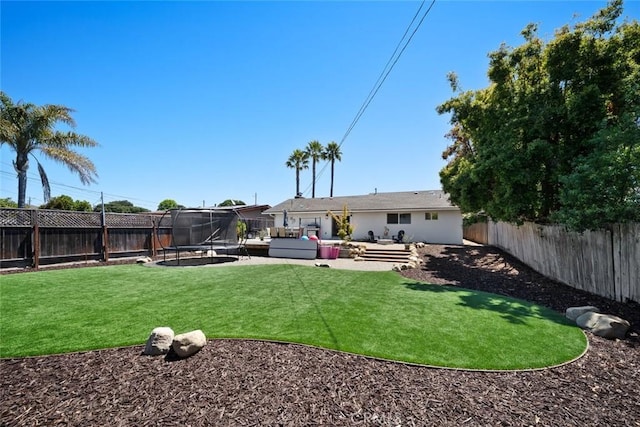 450 Pecan St, Arroyo Grande, CA 93420 - back of property with a trampoline, a fenced backyard, and outdoor lounge area