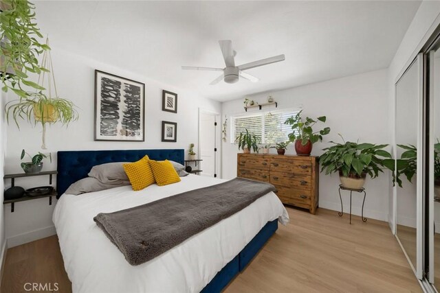 450 Pecan St, Arroyo Grande, CA 93420 - bedroom featuring light wood-style flooring, a closet, and a ceiling fan