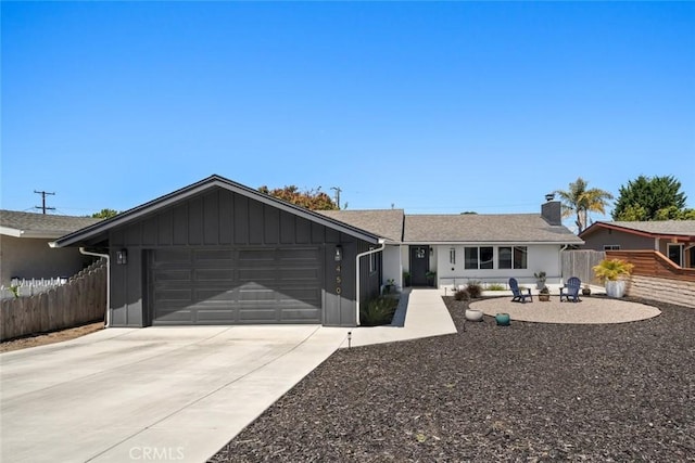 450 Pecan St, Arroyo Grande, CA 93420 - ranch-style home featuring a garage, concrete driveway, and a chimney