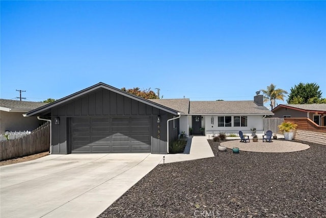 450 Pecan St, Arroyo Grande, CA 93420 - single story home featuring an attached garage, concrete driveway, and a chimney