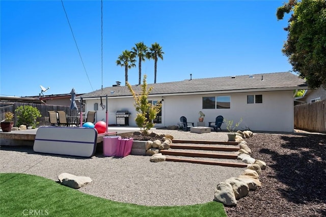 450 Pecan St, Arroyo Grande, CA 93420 - back of house featuring a patio and stucco siding