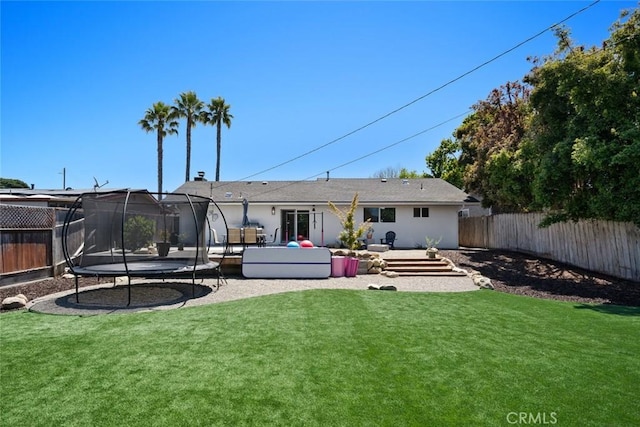450 Pecan St, Arroyo Grande, CA 93420 - rear view of property featuring a trampoline and a fenced backyard