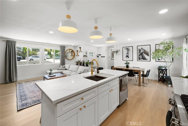 450 Pecan St, Arroyo Grande, CA 93420 - kitchen with appliances with stainless steel finishes, decorative light fixtures, light wood-style floors, recessed lighting, and white cabinets