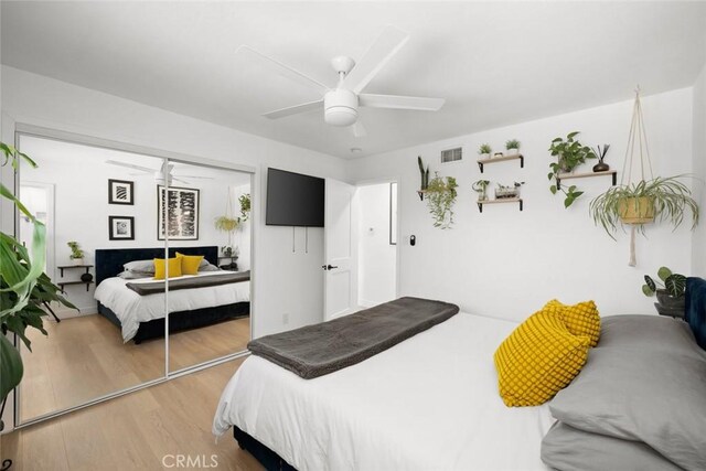 450 Pecan St, Arroyo Grande, CA 93420 - bedroom featuring wood finished floors, a ceiling fan, and a closet