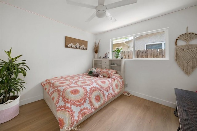 450 Pecan St, Arroyo Grande, CA 93420 - bedroom with wood finished floors and a ceiling fan