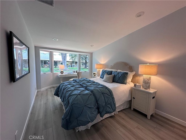 13361 El Dorado Unit 201K, Seal Beach, CA 90740 - bedroom with light wood-style floors and recessed lighting
