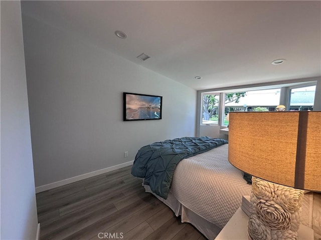 13361 El Dorado Unit 201K, Seal Beach, CA 90740 - bedroom with wood finished floors, vaulted ceiling, and recessed lighting