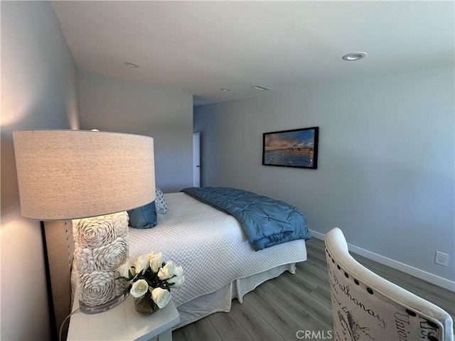 13361 El Dorado Unit 201K, Seal Beach, CA 90740 - bedroom featuring wood finished floors and recessed lighting