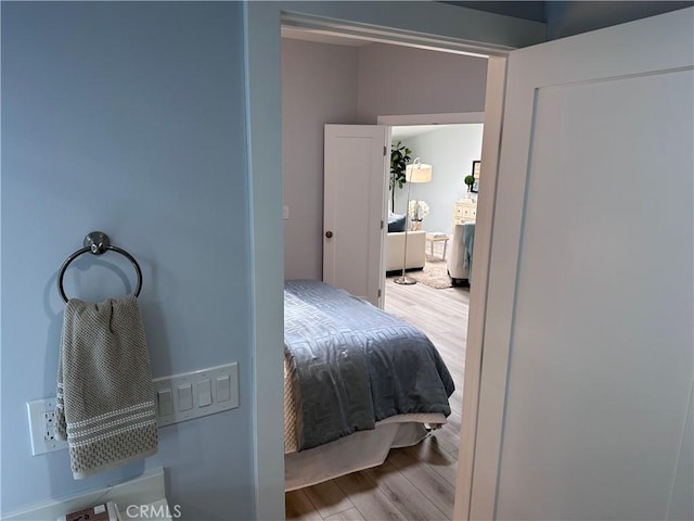 13361 El Dorado Unit 201K, Seal Beach, CA 90740 - bedroom featuring wood finished floors