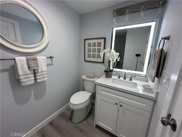 13361 El Dorado Unit 201K, Seal Beach, CA 90740 - bathroom with wood finished floors and vanity