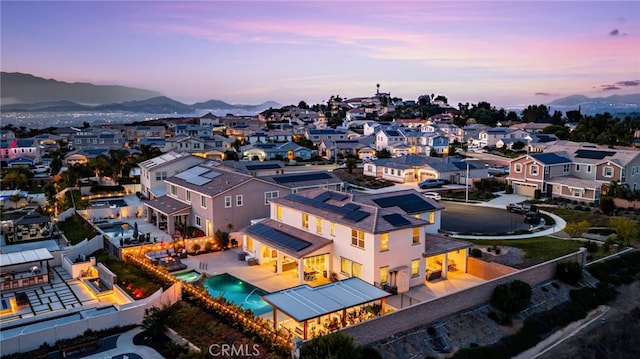 16671 Zest Ct, Riverside, CA 92503 - aerial perspective of suburban area with a pool and mountains