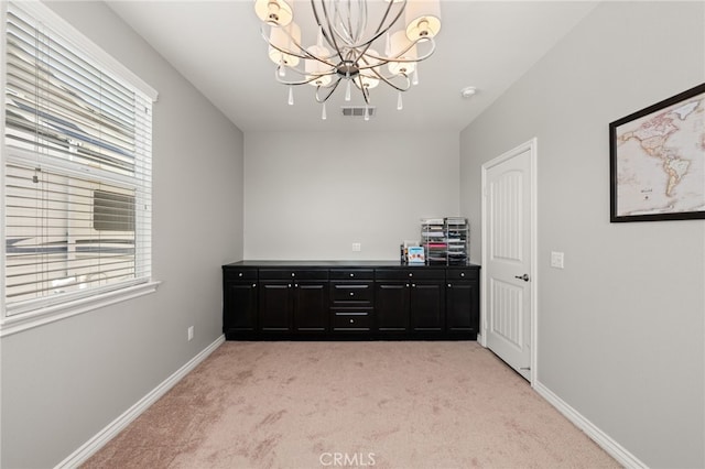 16671 Zest Ct, Riverside, CA 92503 - dining room with light carpet and a chandelier
