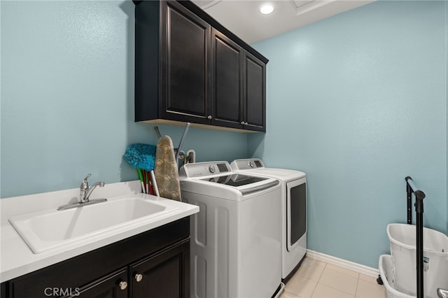 16671 Zest Ct, Riverside, CA 92503 - washroom with cabinet space, independent washer and dryer, and light tile patterned flooring