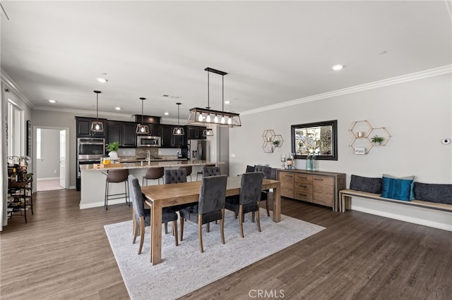 16671 Zest Ct, Riverside, CA 92503 - dining area with recessed lighting, dark wood finished floors, and crown molding
